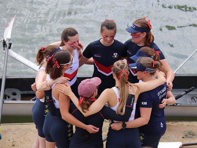 Rowing team huddle